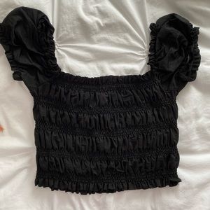 Black cropped off the shoulder top